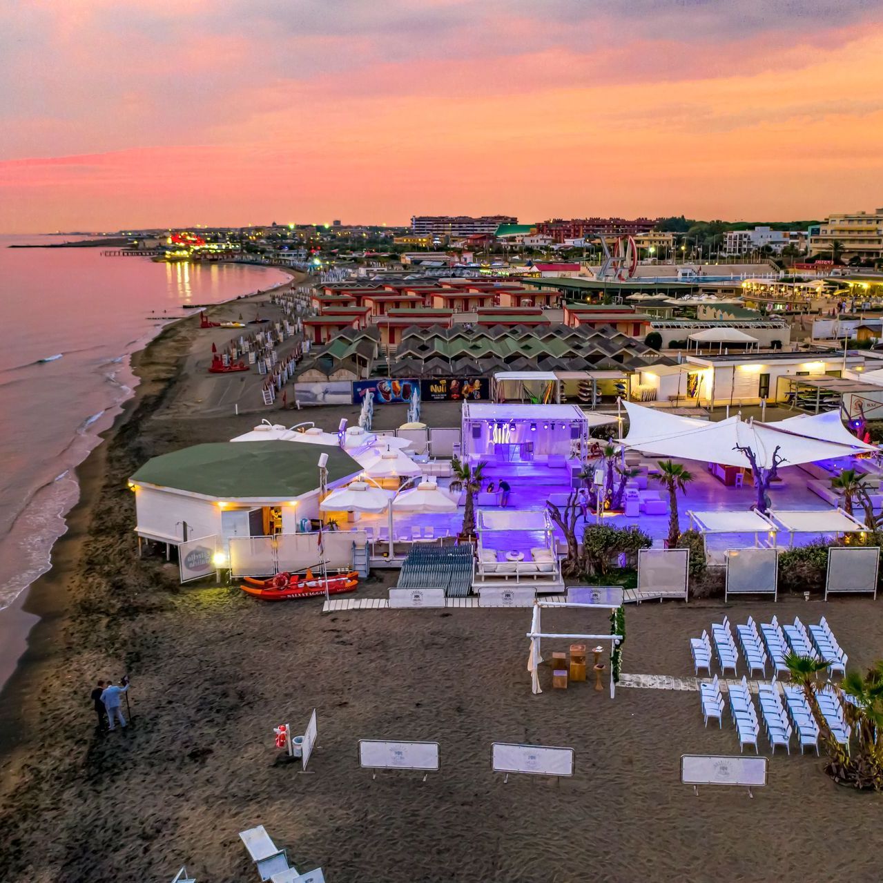 aerial drone photograph of a wedding setup at the beach