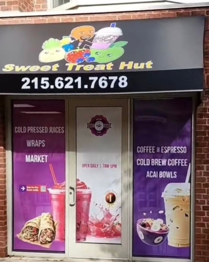 Two cars are parked in front of a building that says women 's putting & health & fitness center