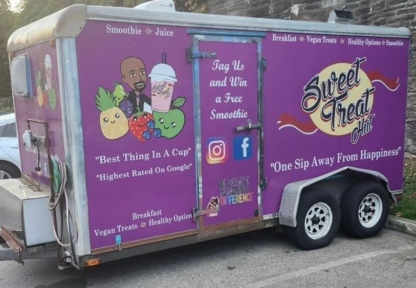 Two cups of oatmeal with bananas and chocolate sauce on top.