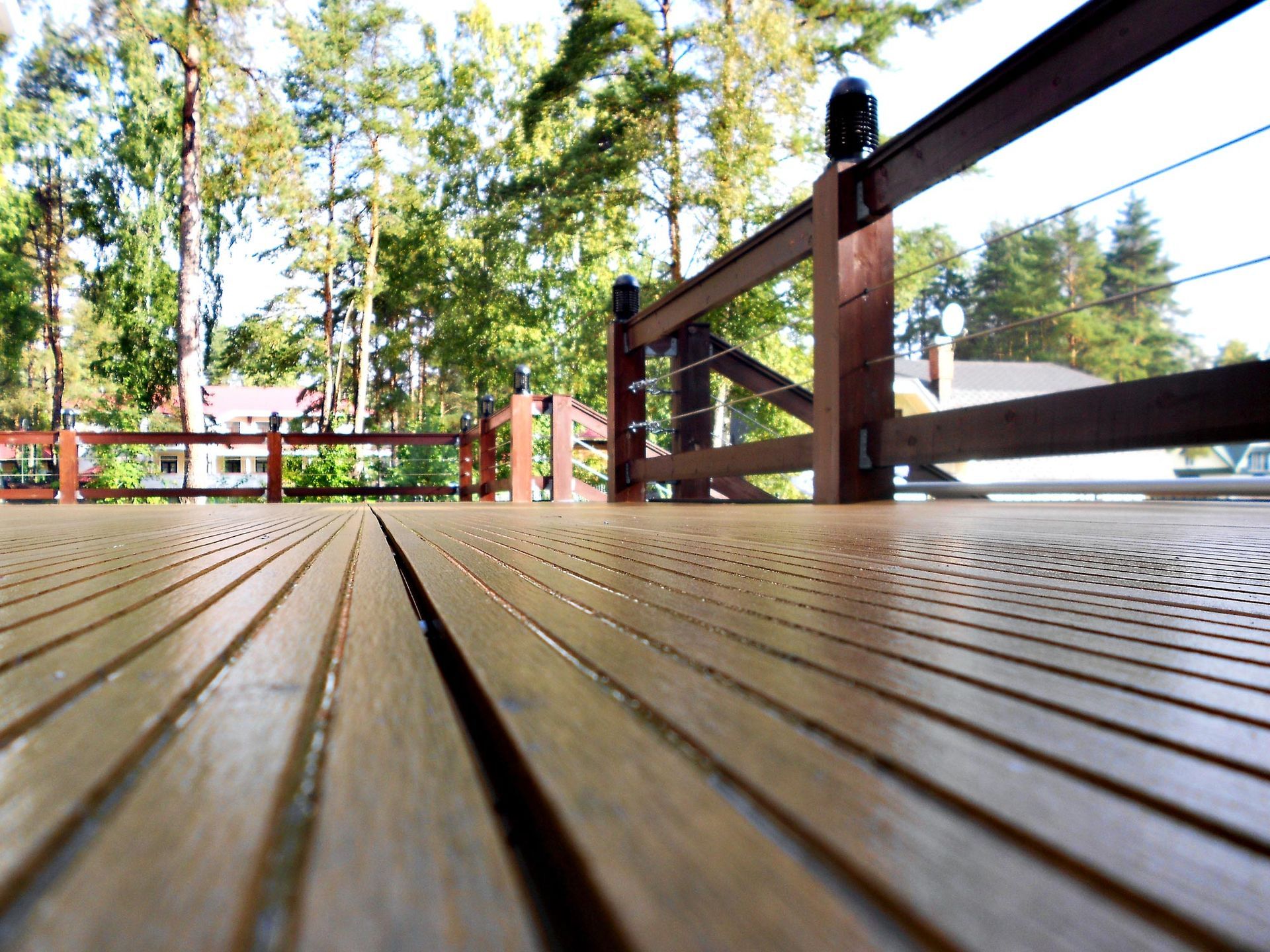 Close-up of a new deck showcasing deck building craftsmanship and fine woodwork details.