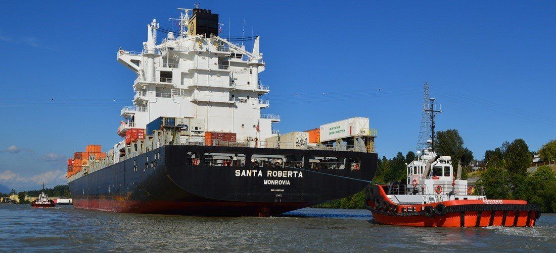 A large cargo ship with the name