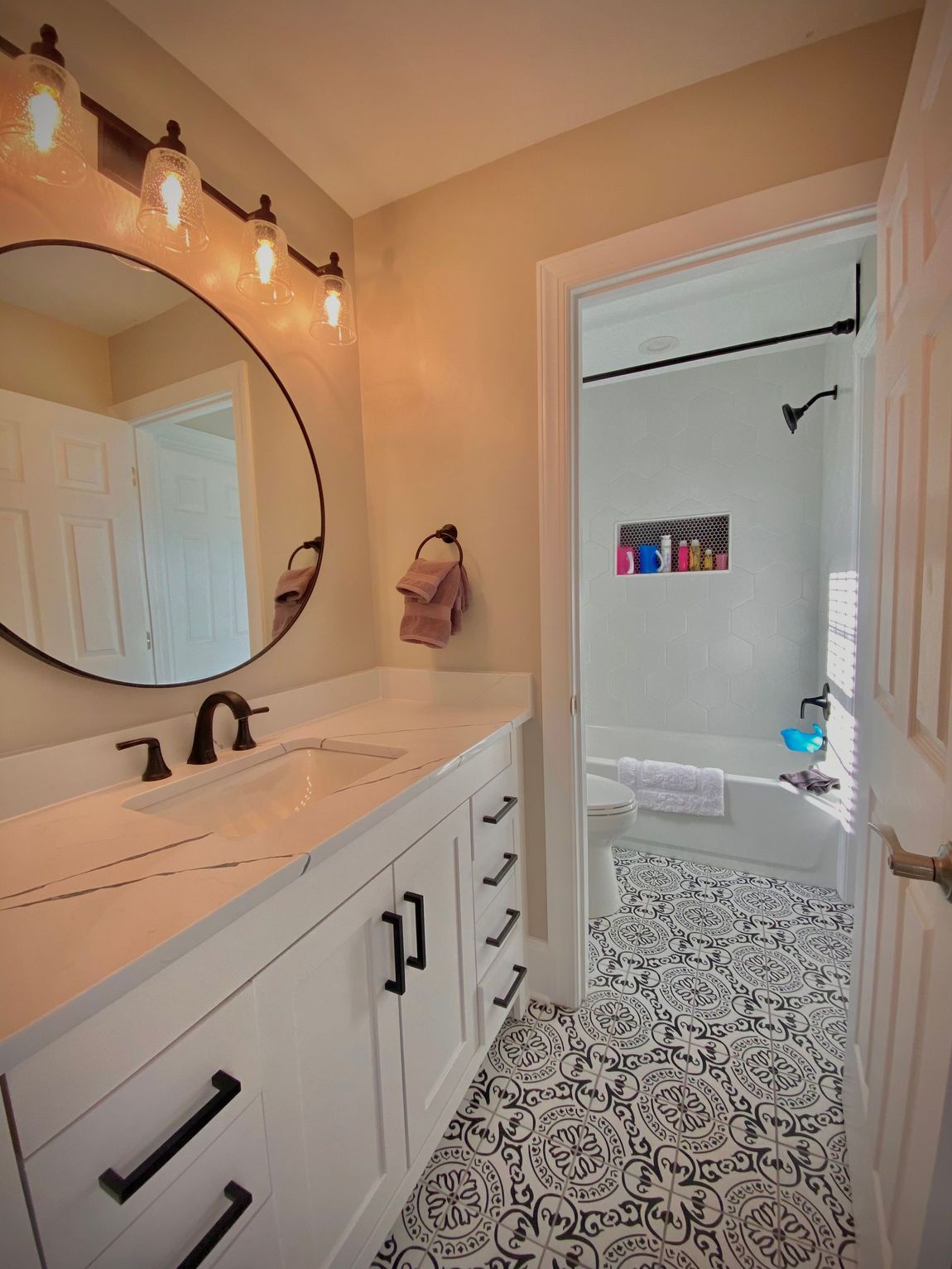 Contemporary bathroom remodel with custom cabinetry and elegant finishes in Greater Baltimore, MD