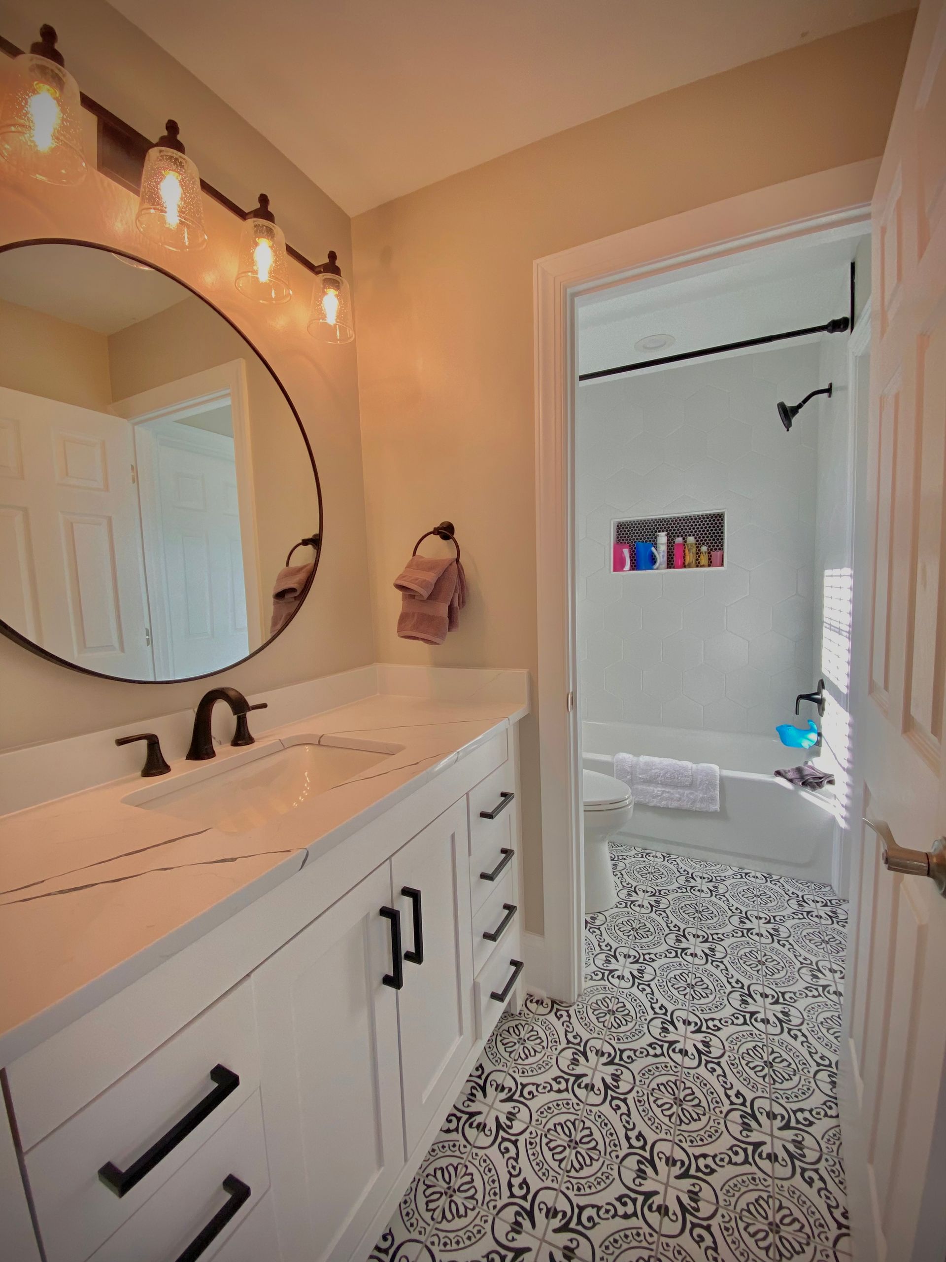 Contemporary bathroom remodel with custom cabinetry and elegant finishes in Westminster, MD.