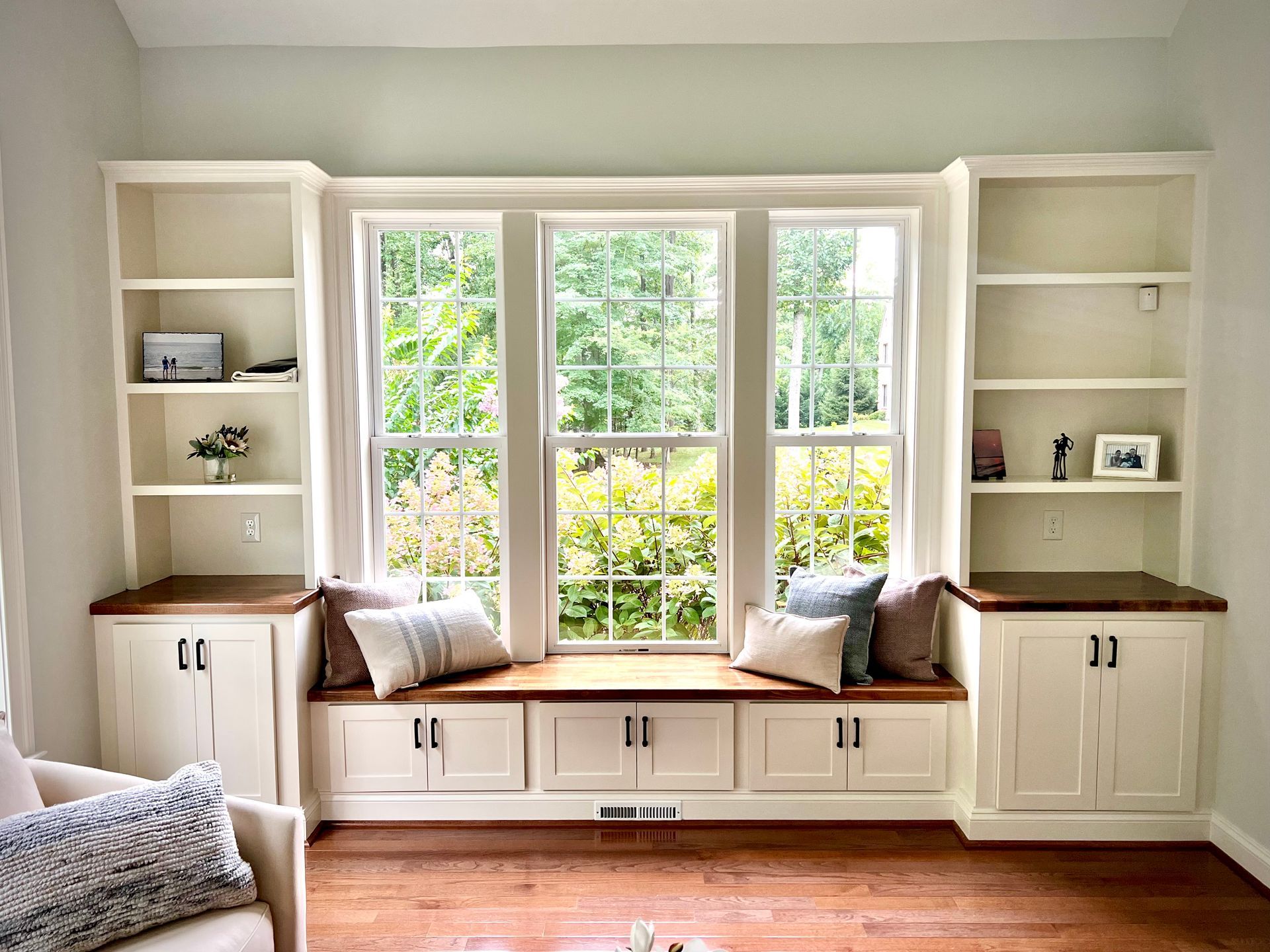 High-quality carpentry craftsmanship in a custom bookshelf and cabinet installation in Westminster, MD.