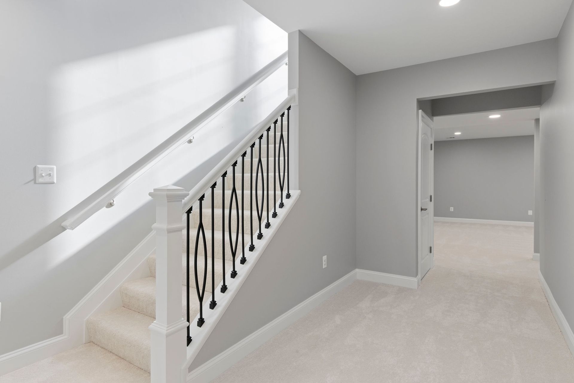 A functional living area created in a remodeled basement.