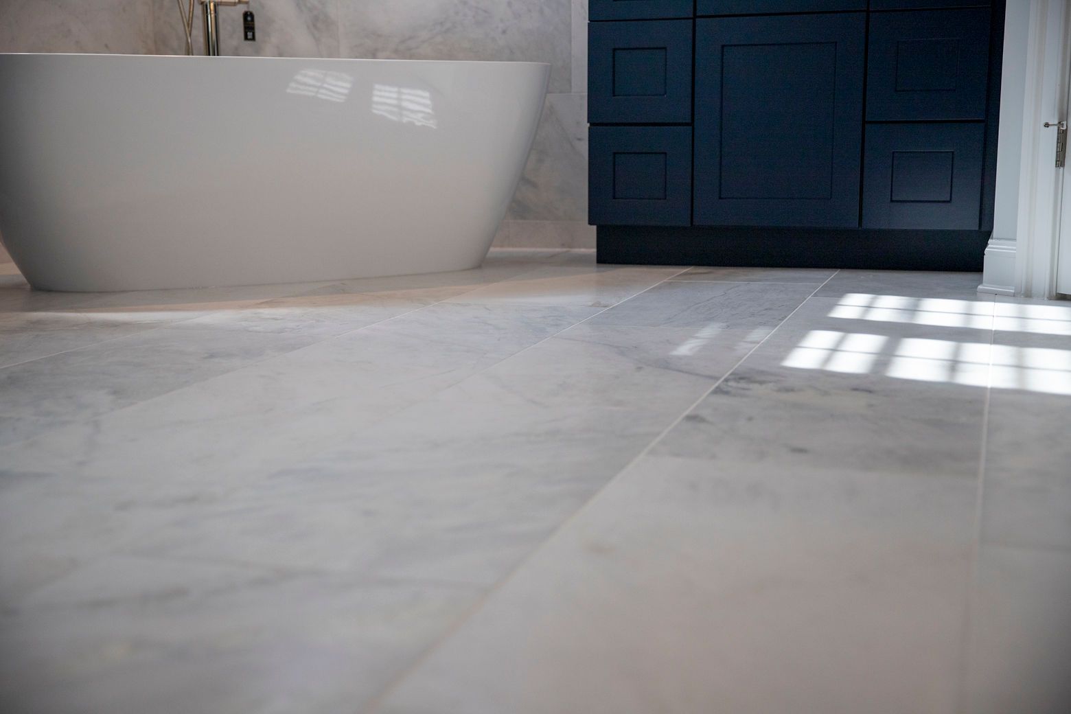 Final view of a stunningly transformed master bathroom in a Reisterstown home.