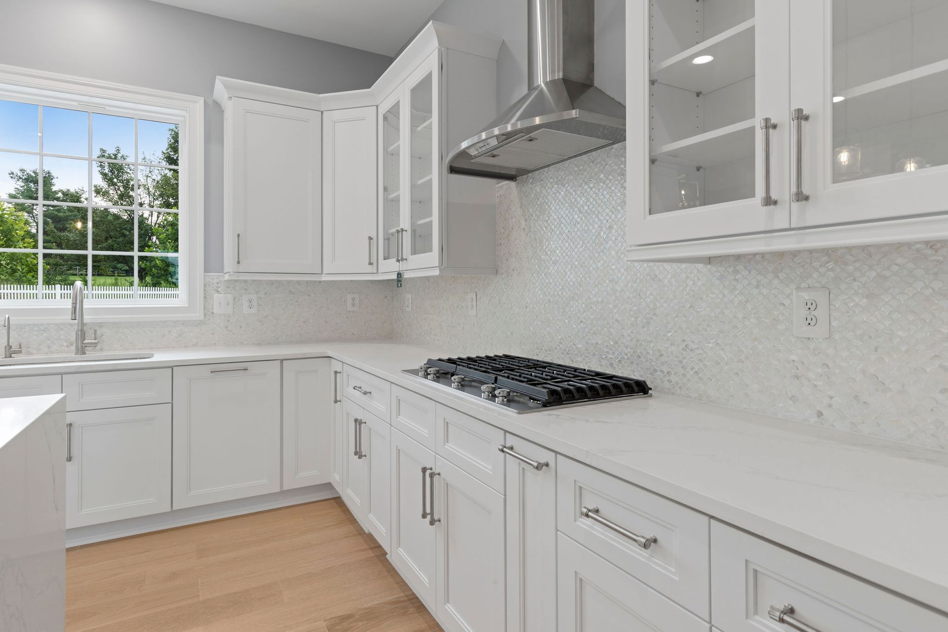 Fully integrated paneled appliances and smart appliance integration in a high-end Maryland kitchen renovation for 2026.