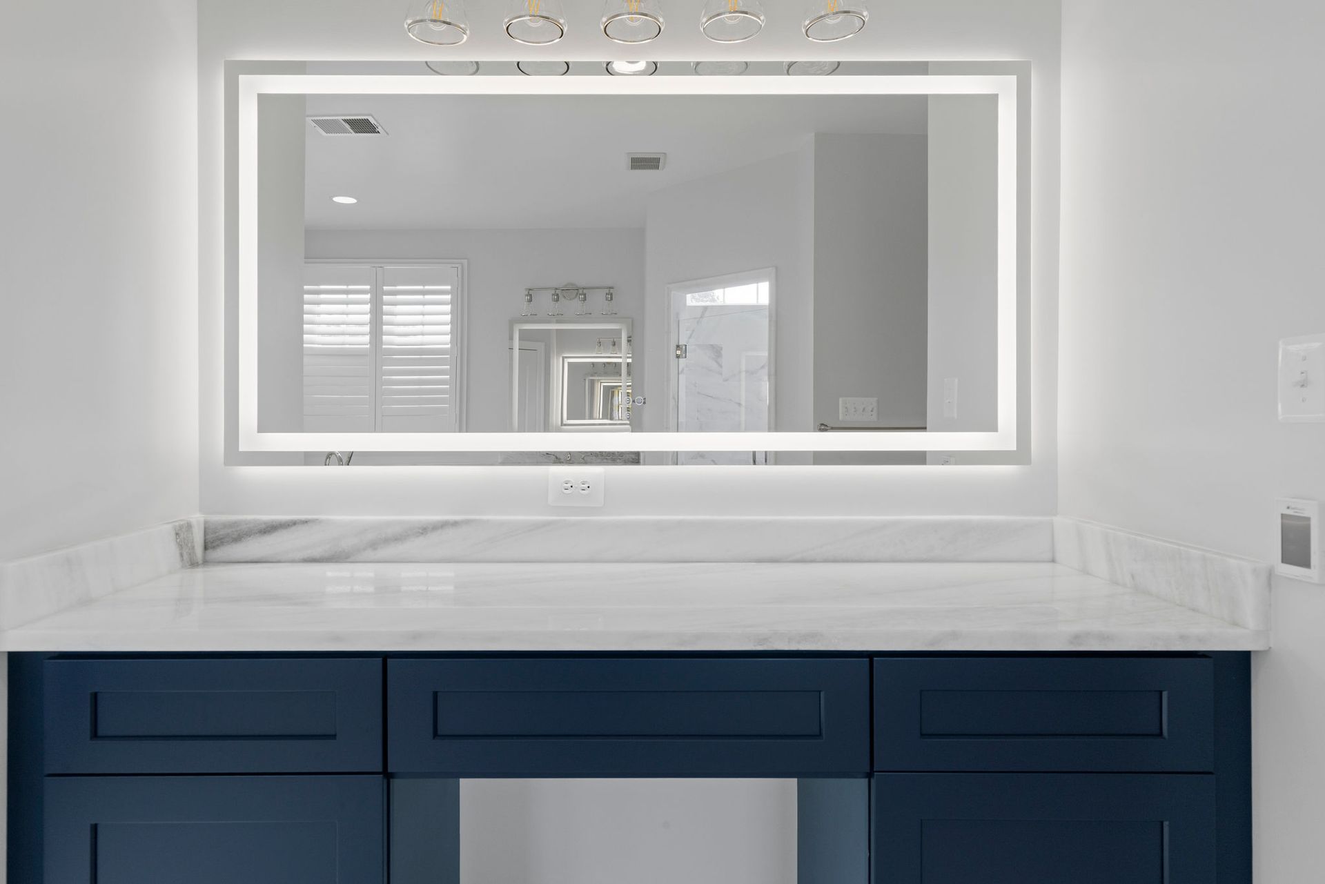Reisterstown master bathroom remodel with a modern freestanding tub.
