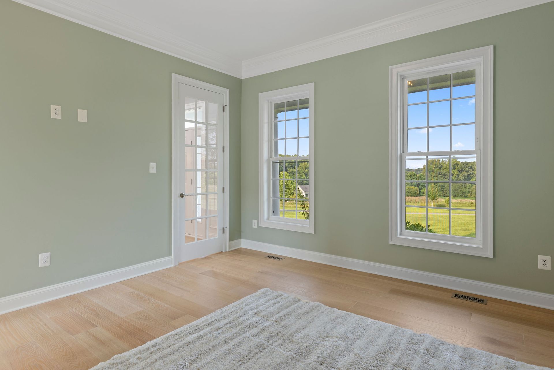 A bright, functional office space after a complete room renovation.