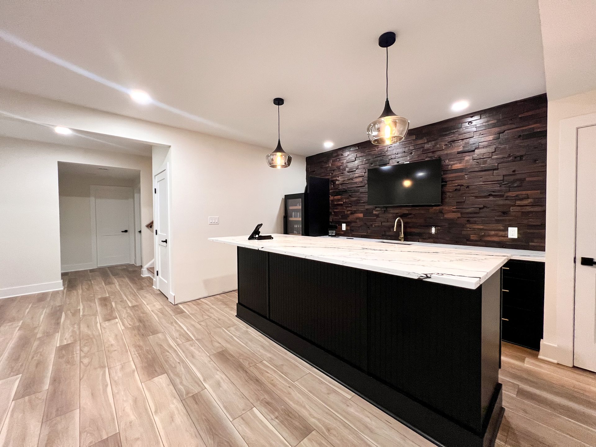 Contemporary basement bathroom in Owings Mills with a sleek vanity and modern shower.