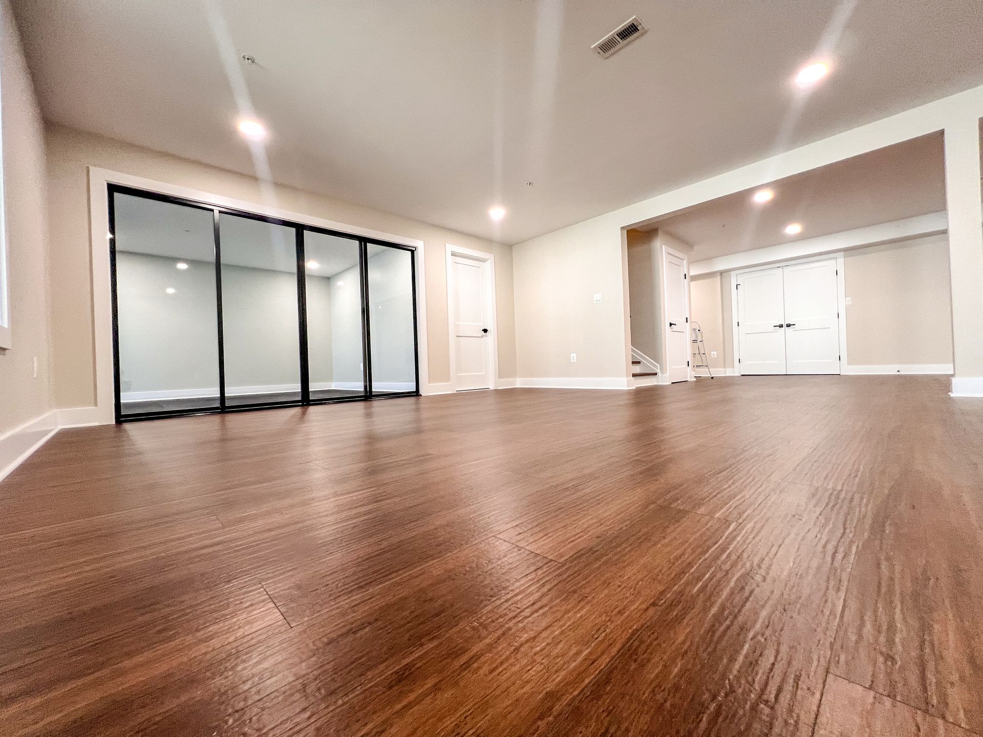 High-end basement transformation showcasing expert craftsmanship and comprehensive remodeling services.