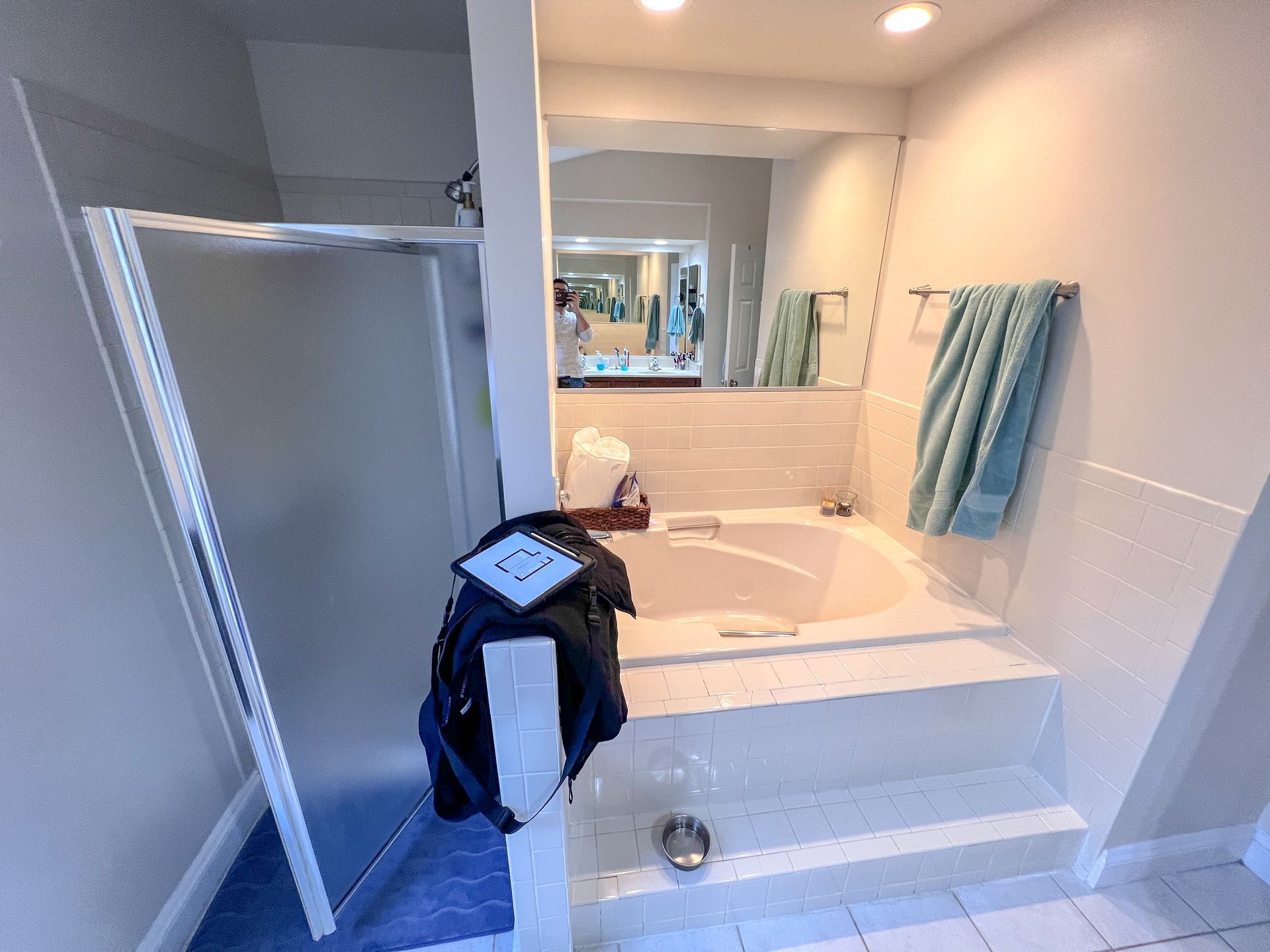 Beautifully renovated bathroom in Ellicott City, MD, with a focus on functionality and style, including a walk-in shower and ample storage.