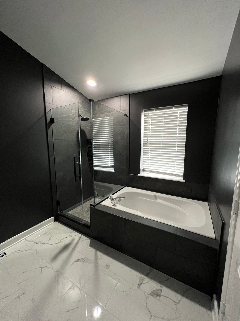 Beautifully remodeled bathroom featuring new tiles, lighting, and modern amenities in Reisterstown, MD And nearby areas