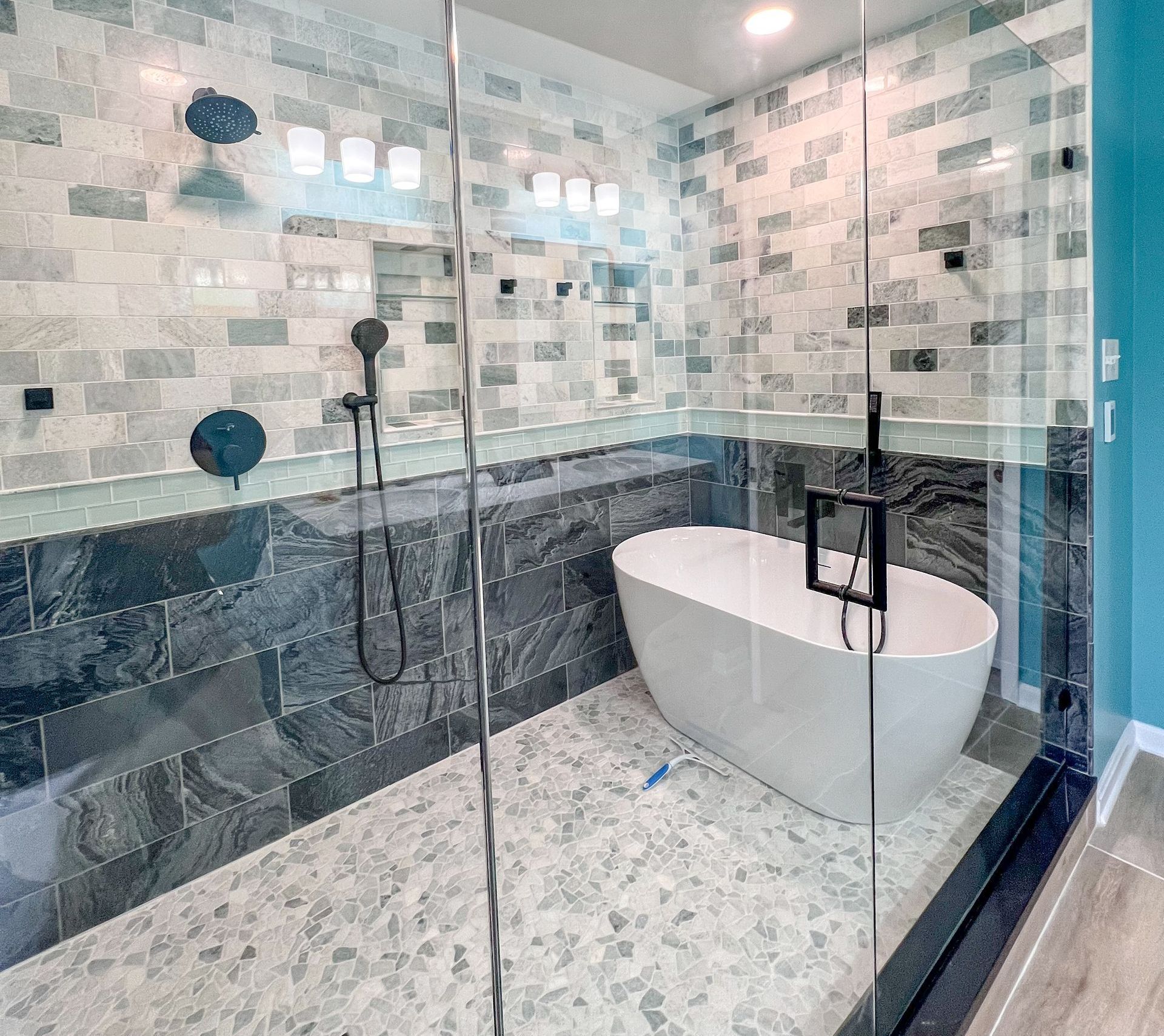 Spa-like bathroom retreat in Ellicott City, MD, with a focus on clean lines, a neutral color palette, and modern fixtures.