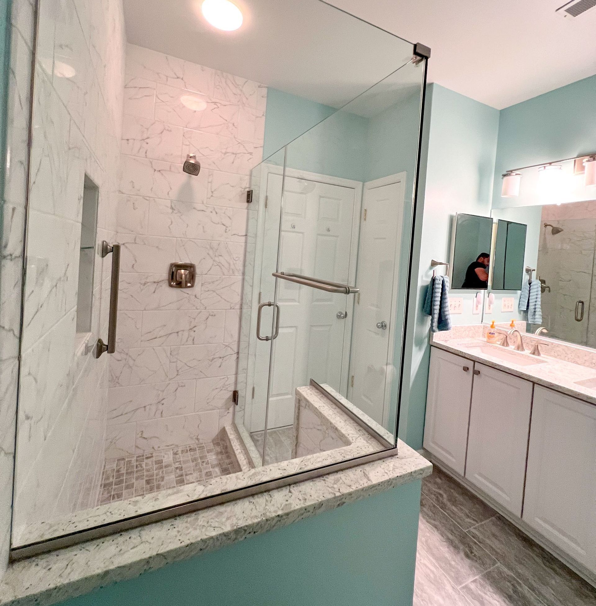 Modern walk-in shower, angled view.