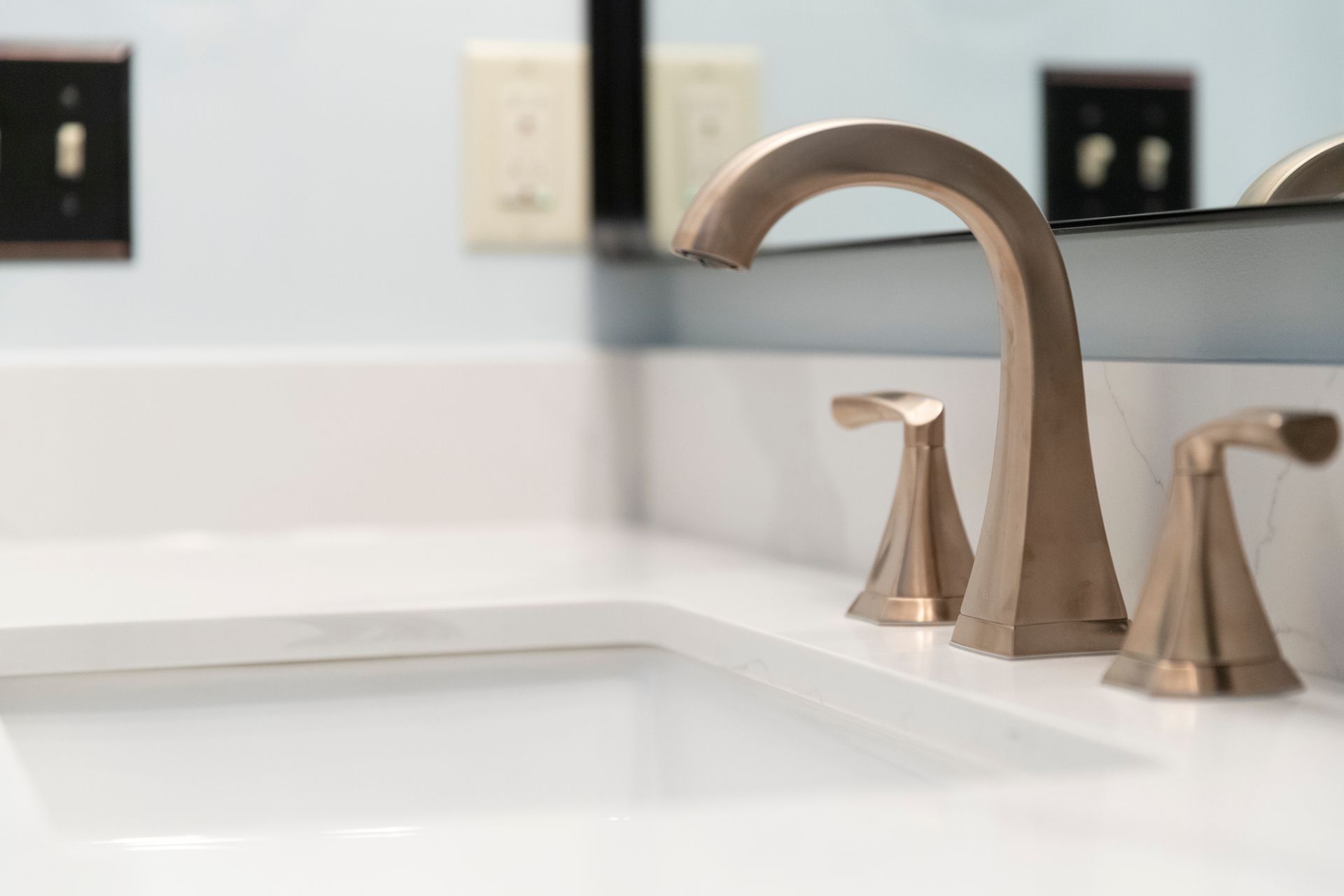 Centered sink vanity with white countertop