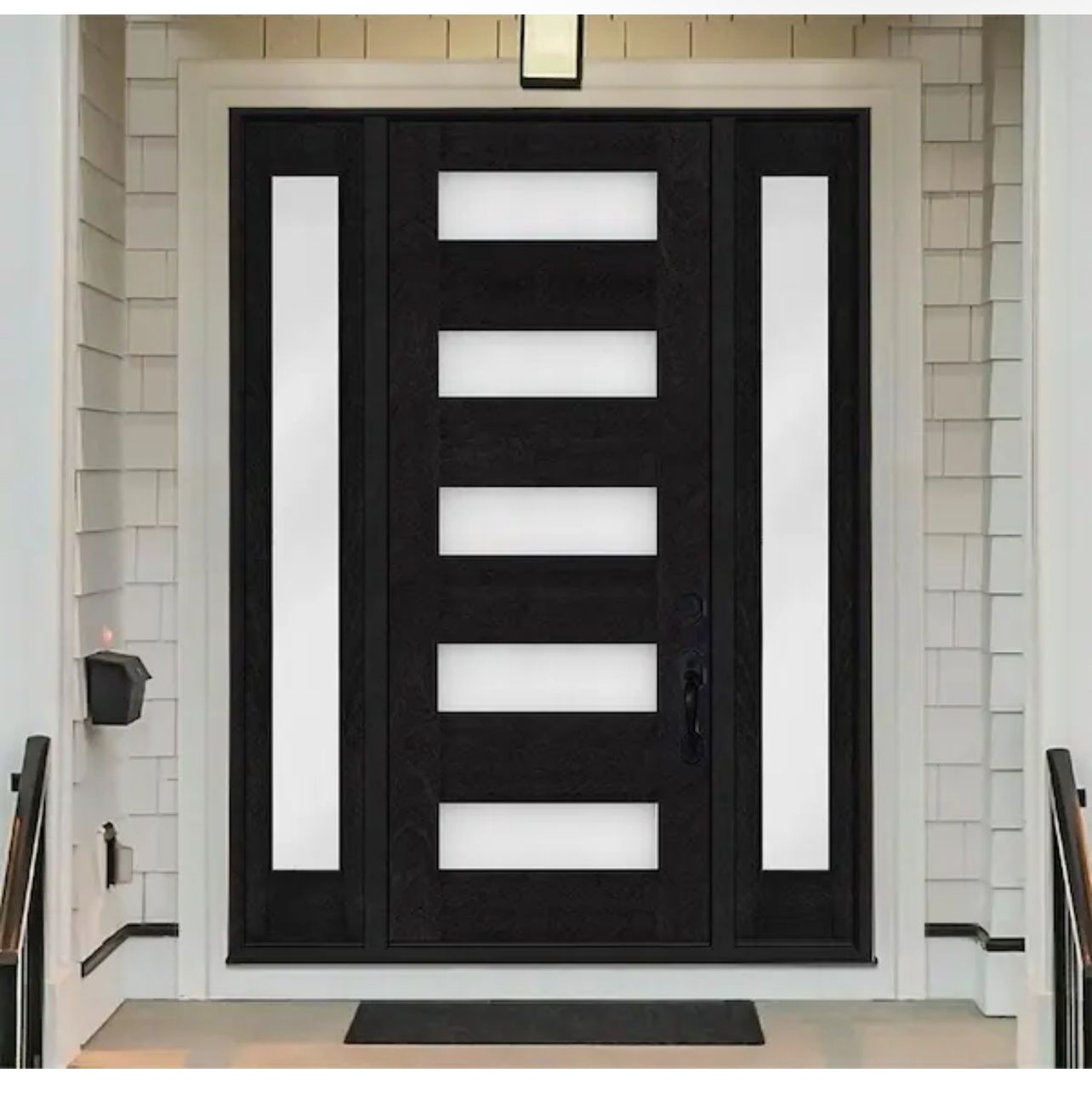 A contemporary black front door with frosted glass panels in Greater Baltimore, MD