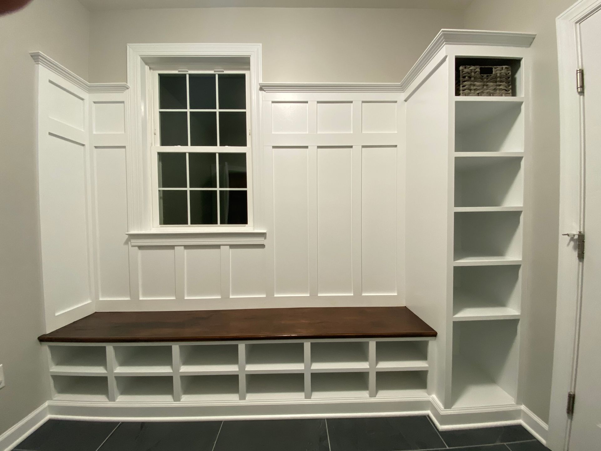 Entryway organization with built-in bench.