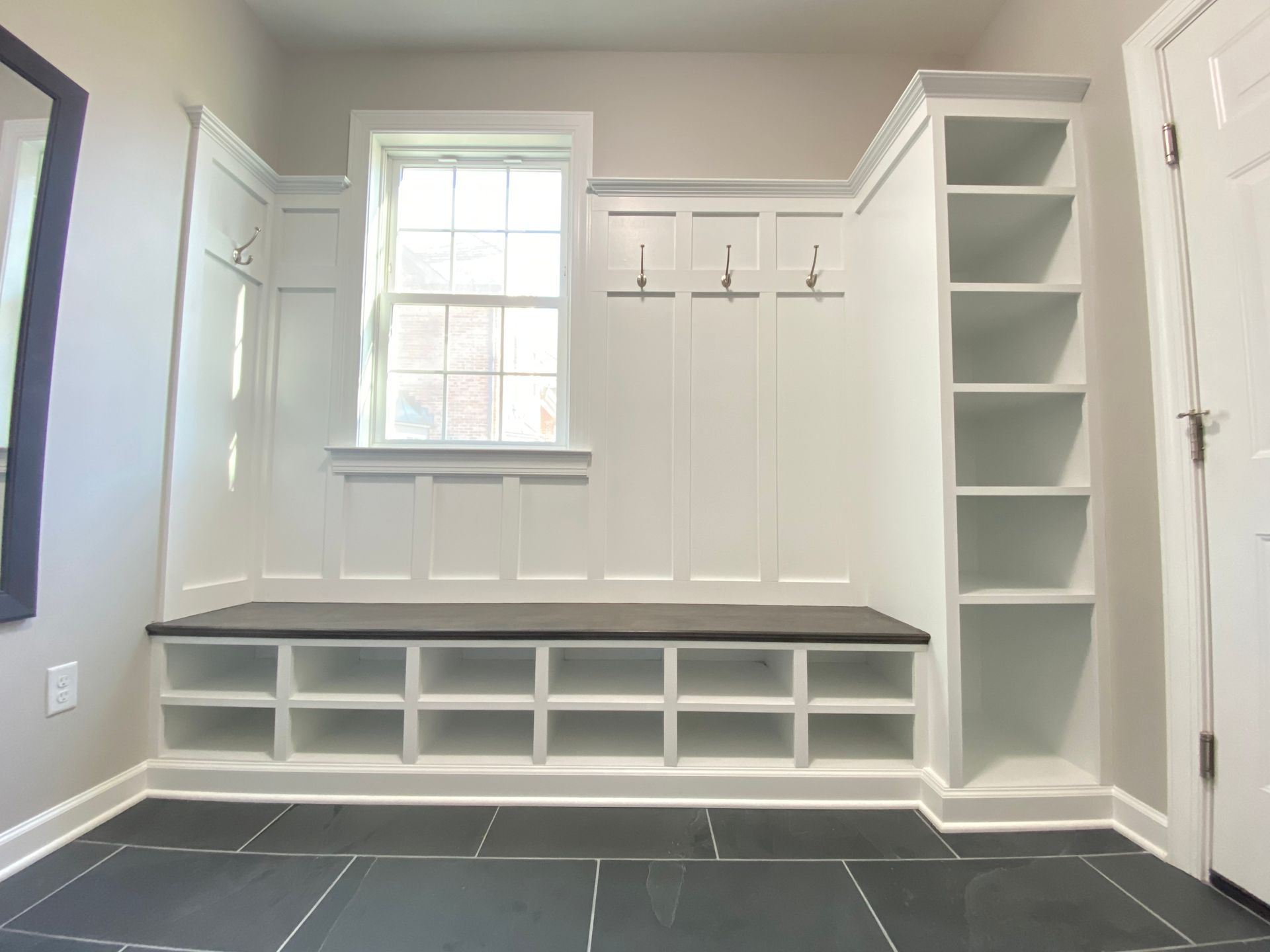 Built-in mudroom storage solution.