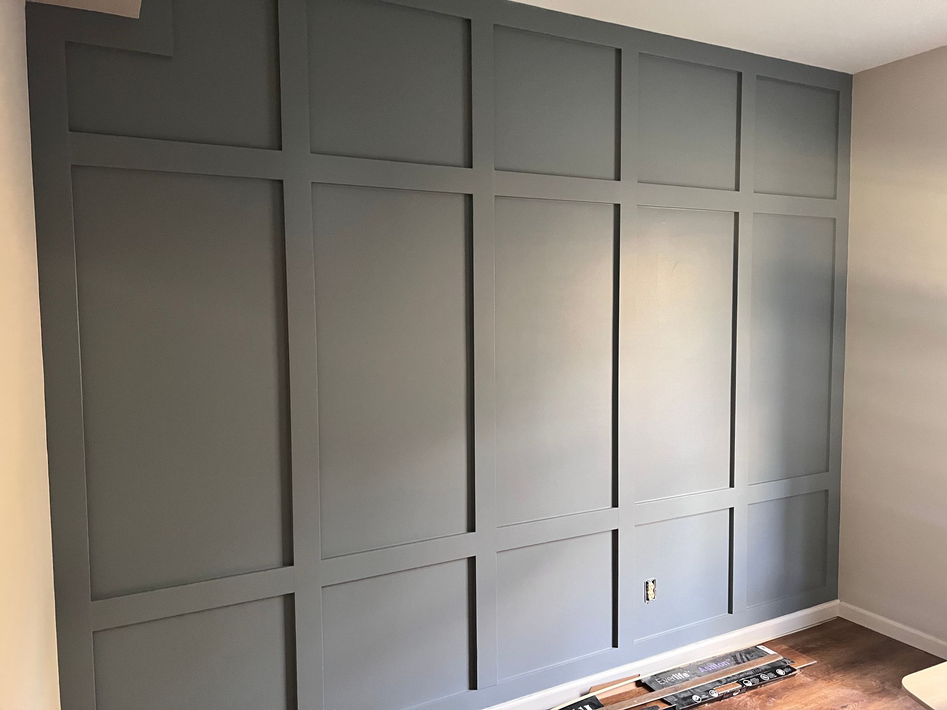 Wainscoting installation in Milford Mill home, with the wainscoting extending to the ceiling.