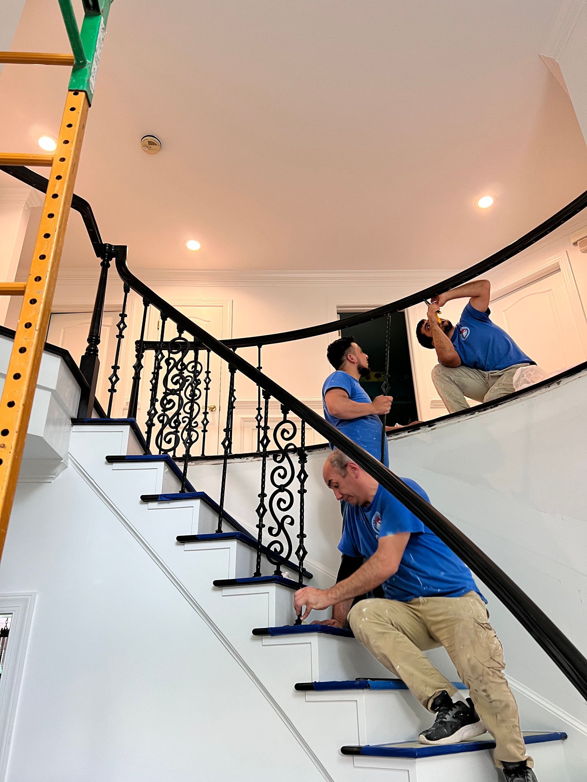 A carpenter building a staircase in Milford Mill, MD home.