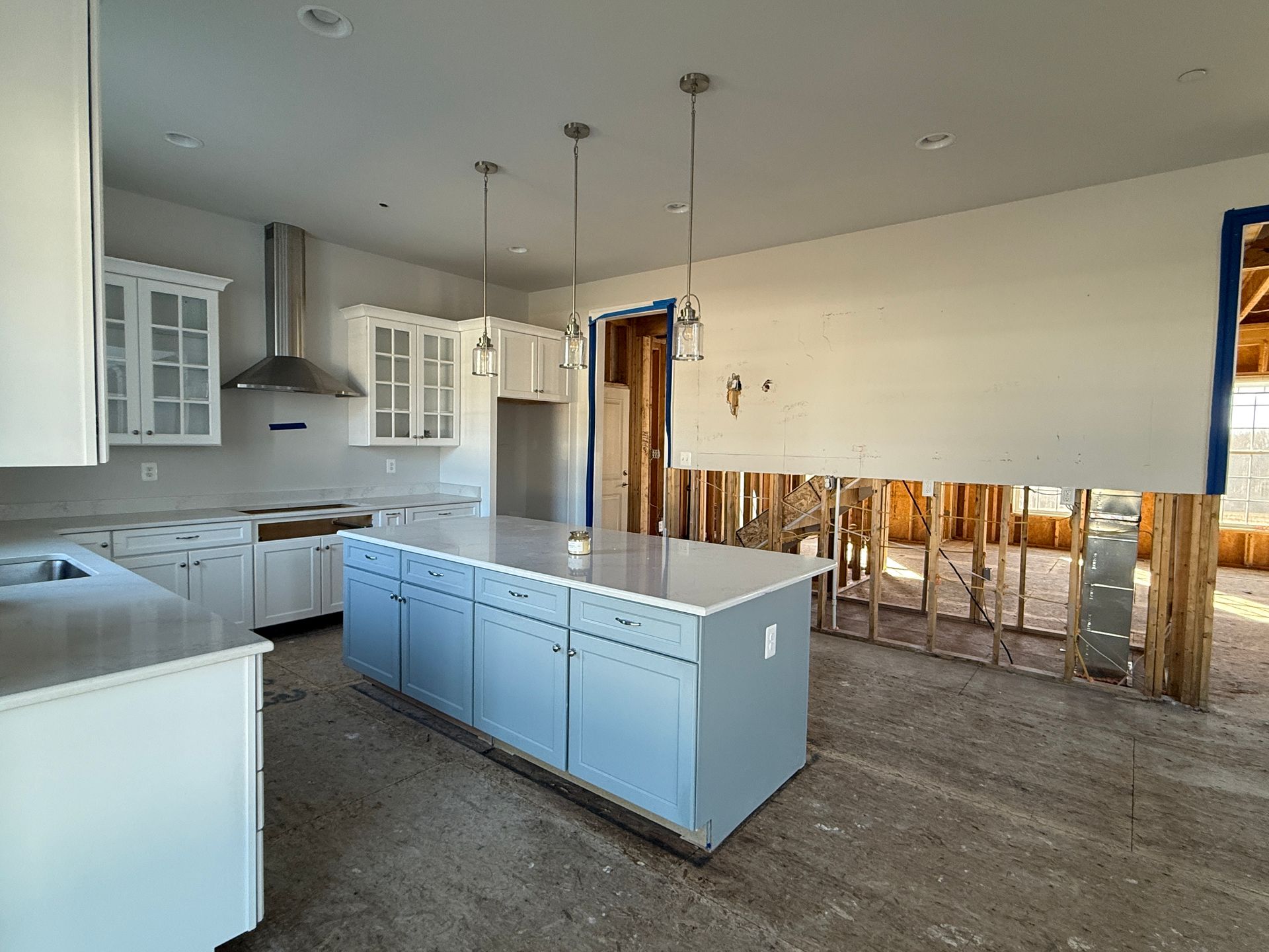 Before & After: Kitchen remodel after water damage. All new cabinets and countertops installed.