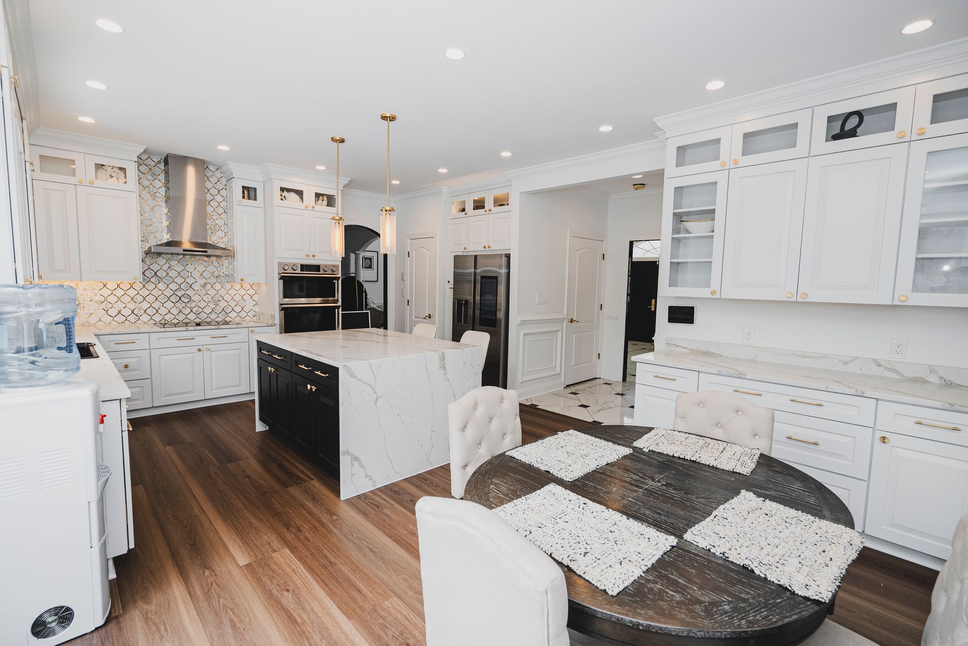 Before and after structural kitchen reconfiguration in Cockeysville MD showing a new open floor plan.