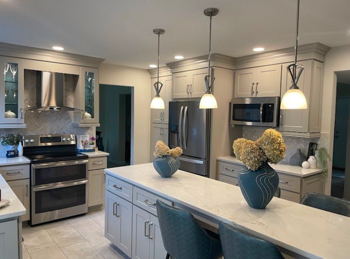 Contemporary kitchen renovation with custom cabinetry and high-end appliances in Westminster, MD.