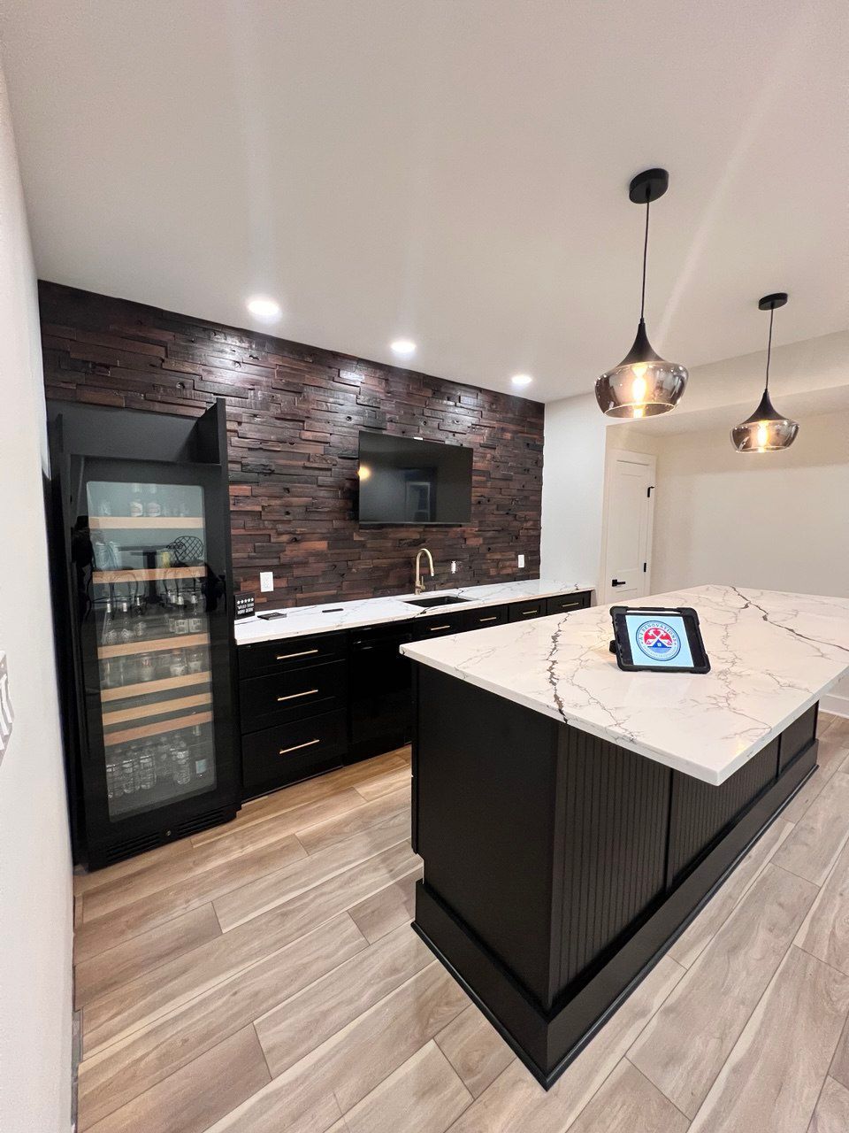 Beautiful kitchen renovation featuring custom countertops, upgraded lighting, and stylish design in Westminster, MD.