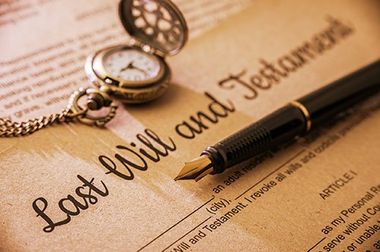Fountain pen, pocket watch on a last will and testament - Estate Planning i n Phoenix, AZ