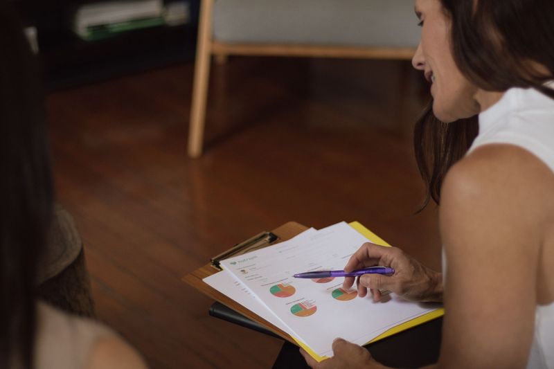 registered dietitian creating personalized nutrition plan with healthy meal