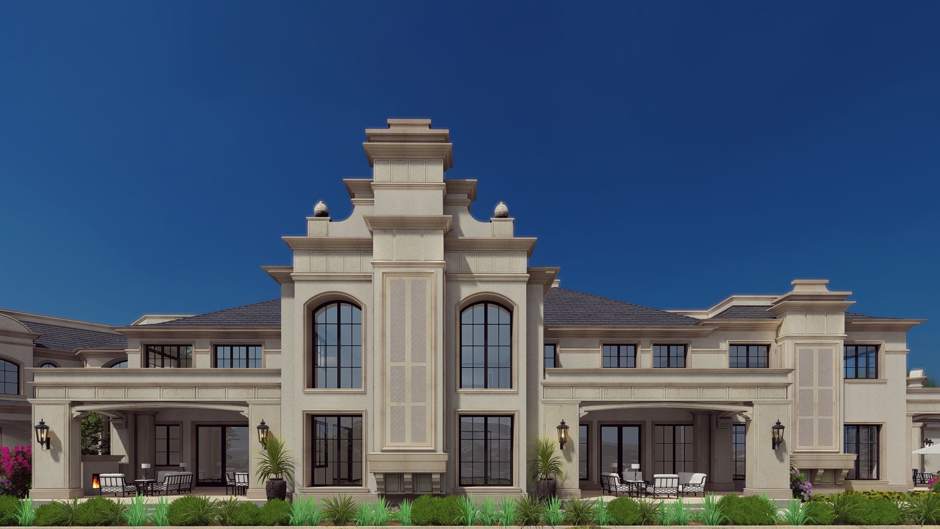 A large white house with a blue sky in the background