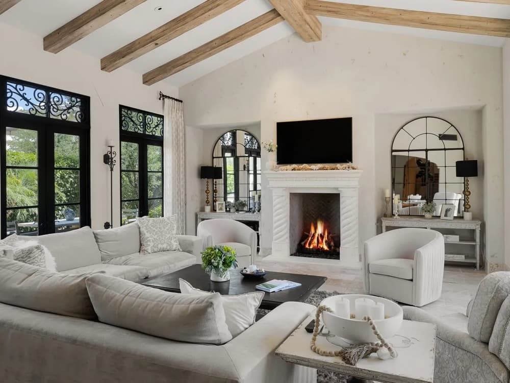 living room with wood beam ceiling