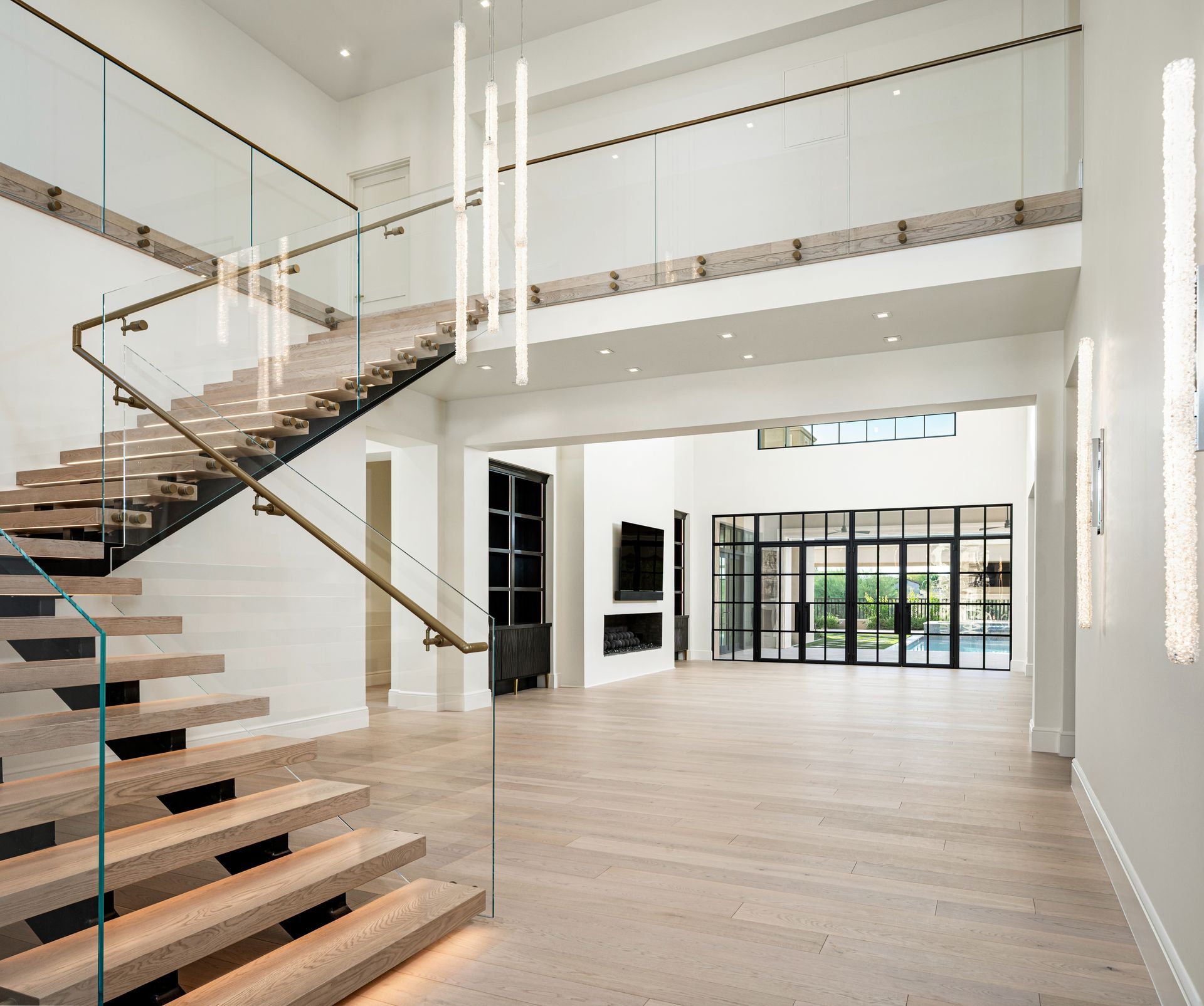 modern staircase and chandelier