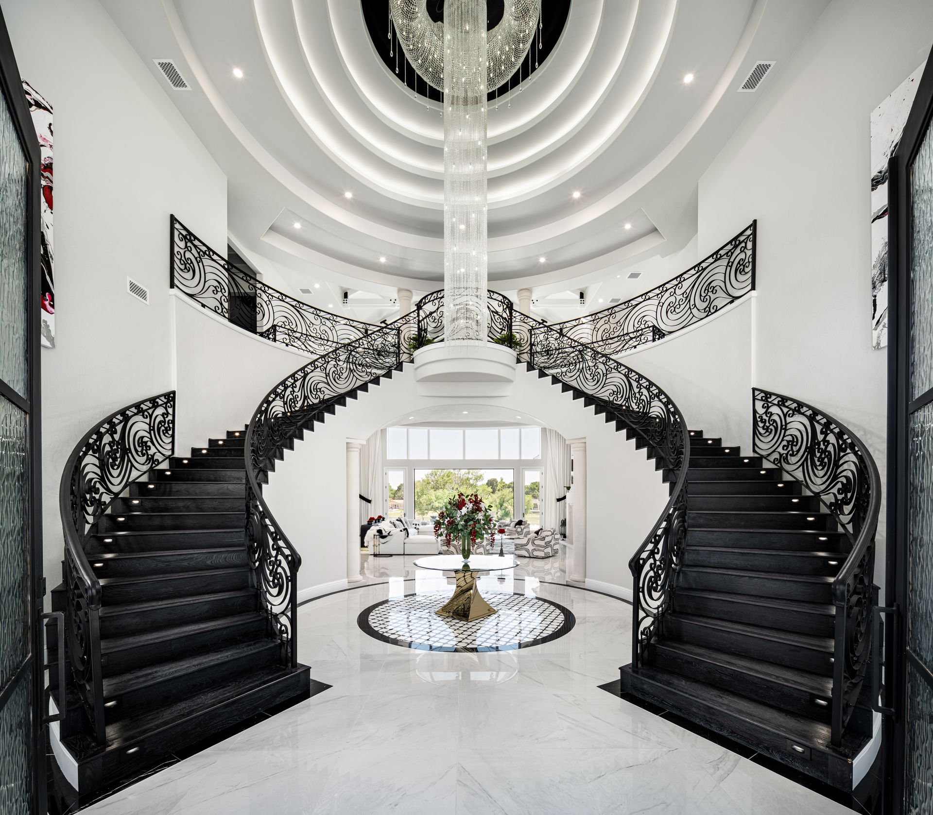 There is a large spiral staircase in the middle of the room.