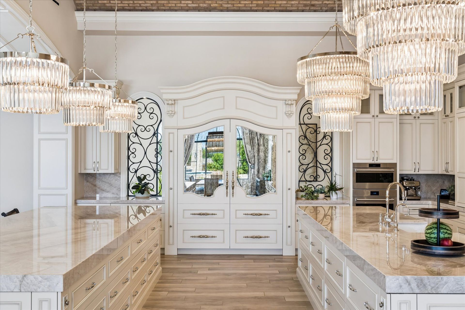 Luxury custom hidden refrigerator designed as an Old World French armoire with mirrored glass doors 