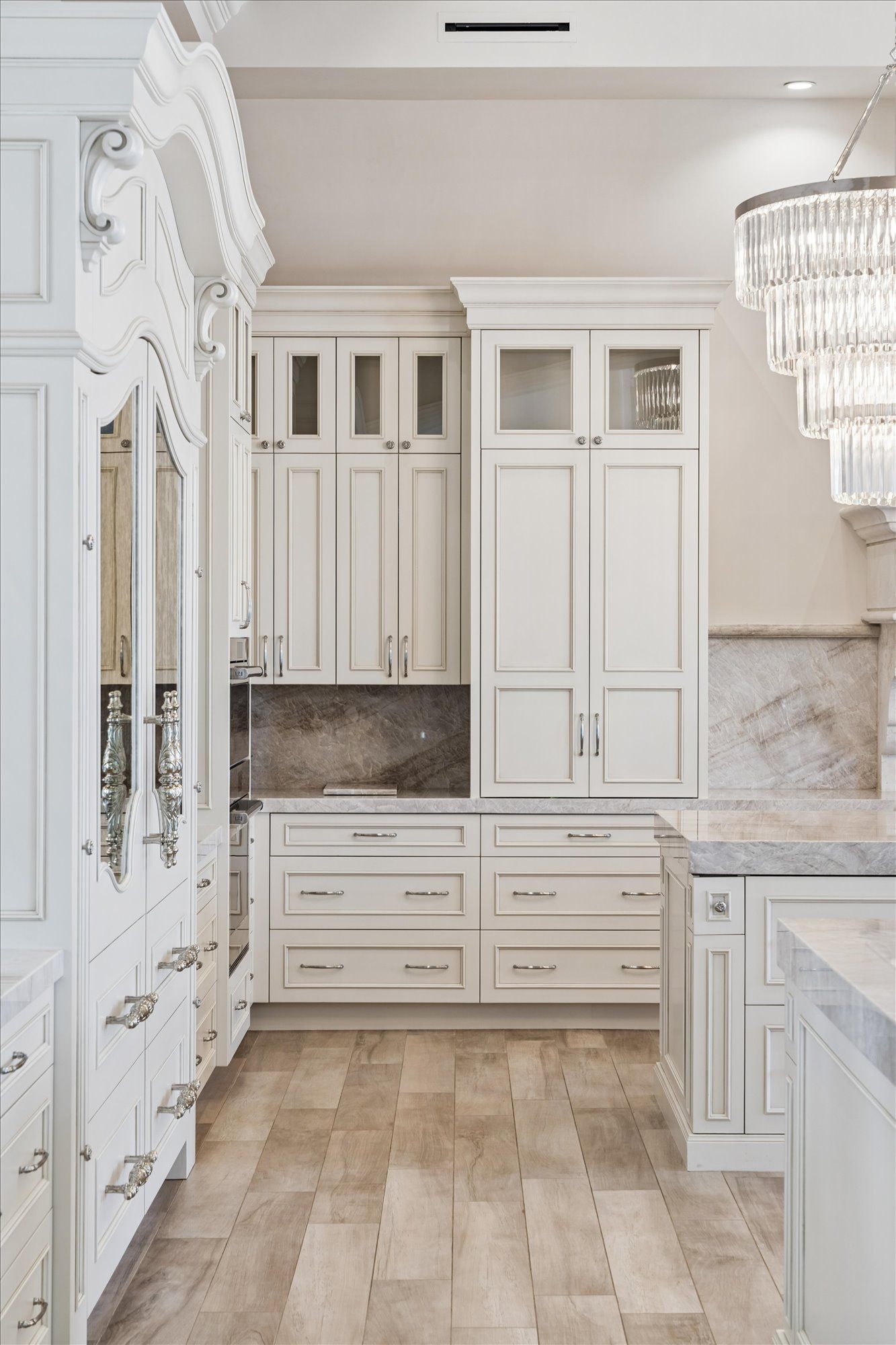Armoire hidden fridge design by Fratantoni Interior Designers