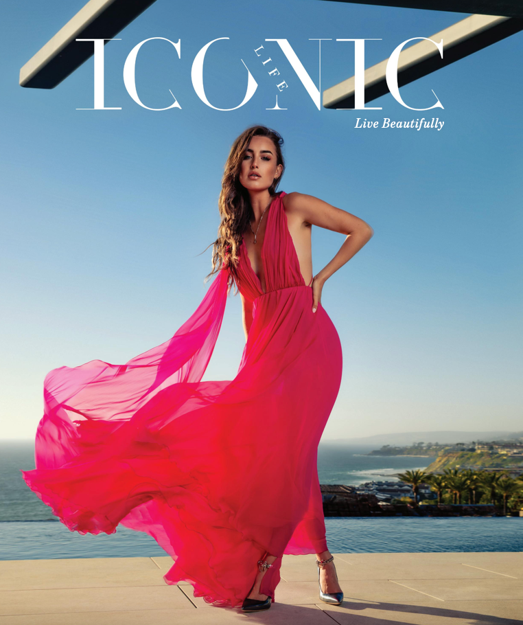 A woman in a pink dress is on the cover of iconic magazine