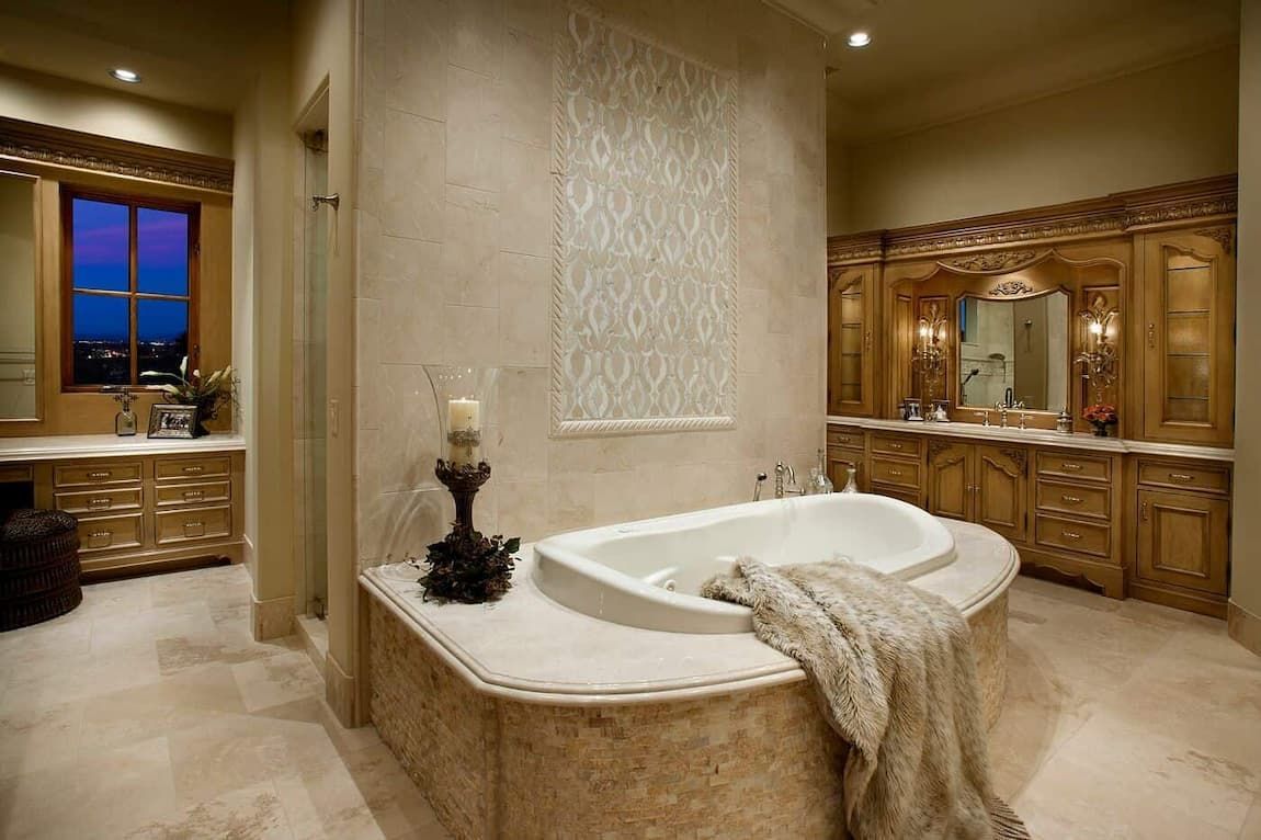 bathroom with gold and brass fixtures