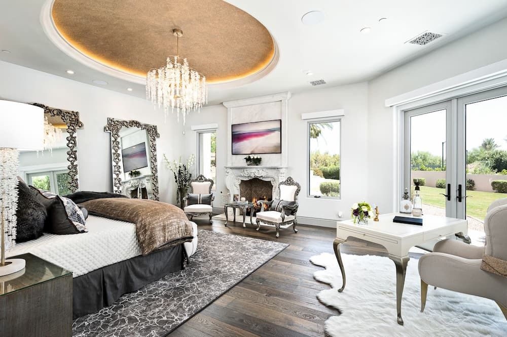 Luxury master bedroom with a stunning ceiling focal point