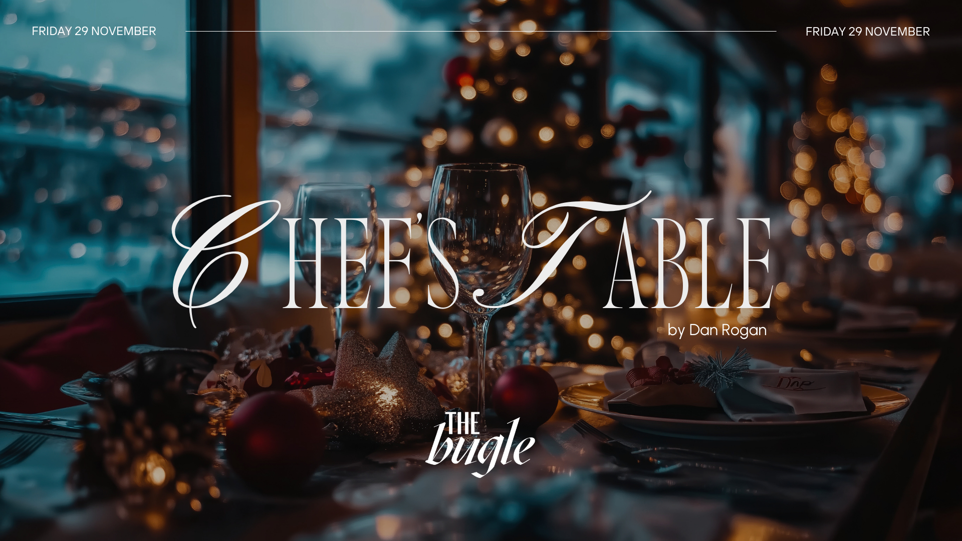 A christmas table with a christmas tree in the background.