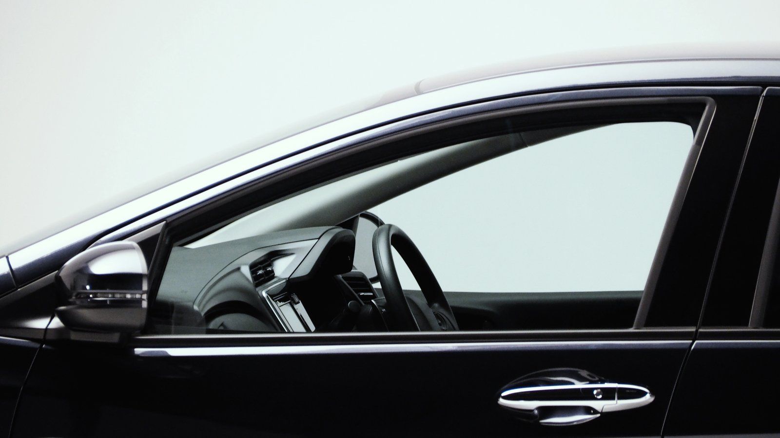 a shining black car with clear window