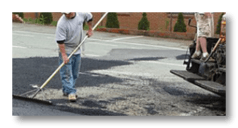 Asphalt Sealcoating — Worker in Charlottesville, Virginia