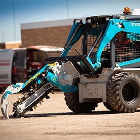 chain trencher truck in sky blue color