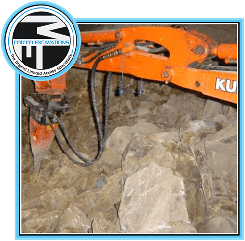 digging concrete with big rocks after