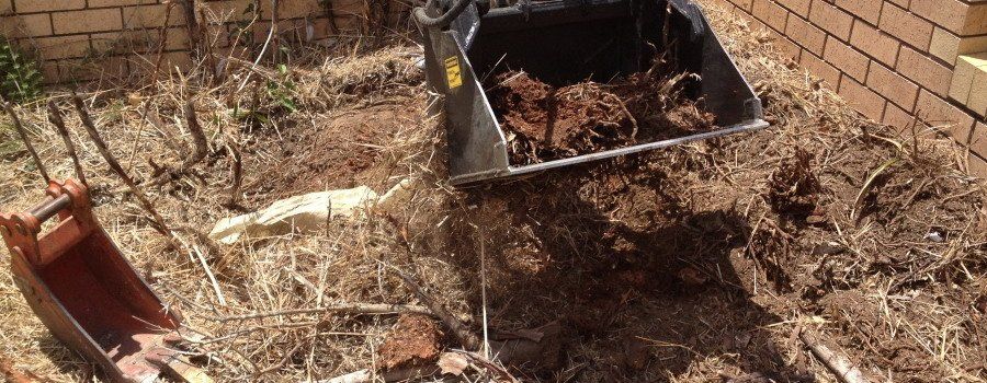 excavator bucket with soil