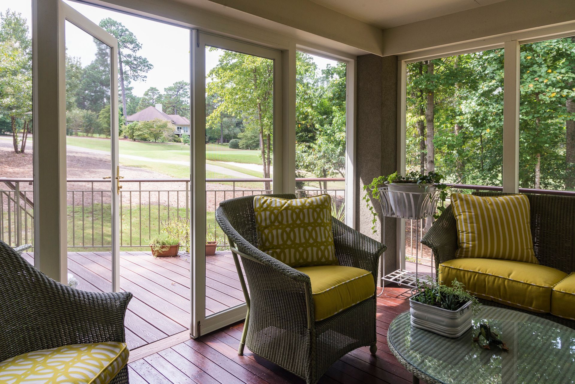Screened porch with couch