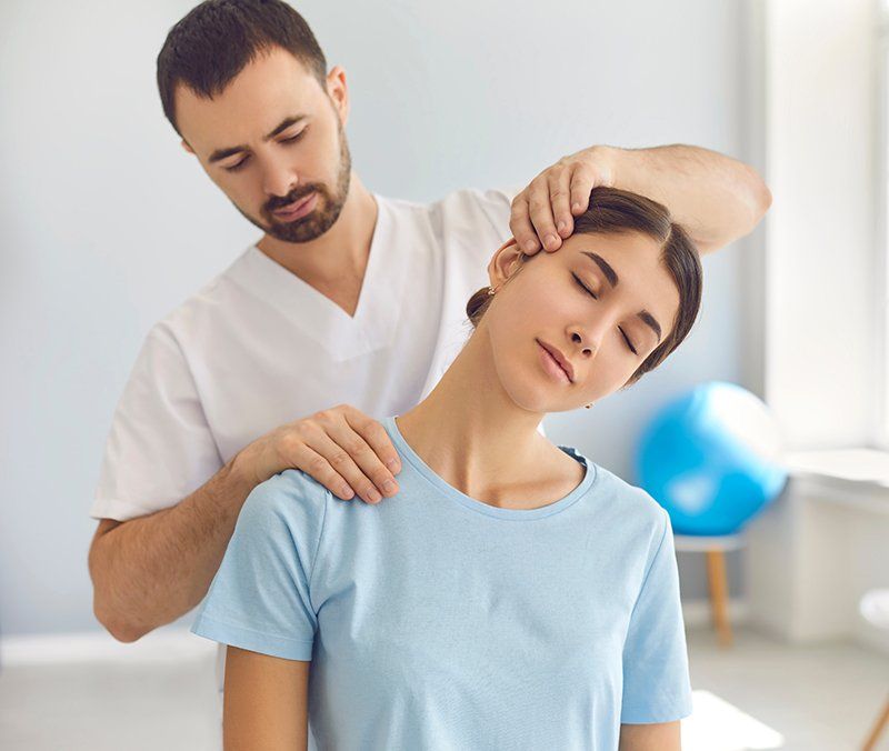Person Checking The Patient Neck
