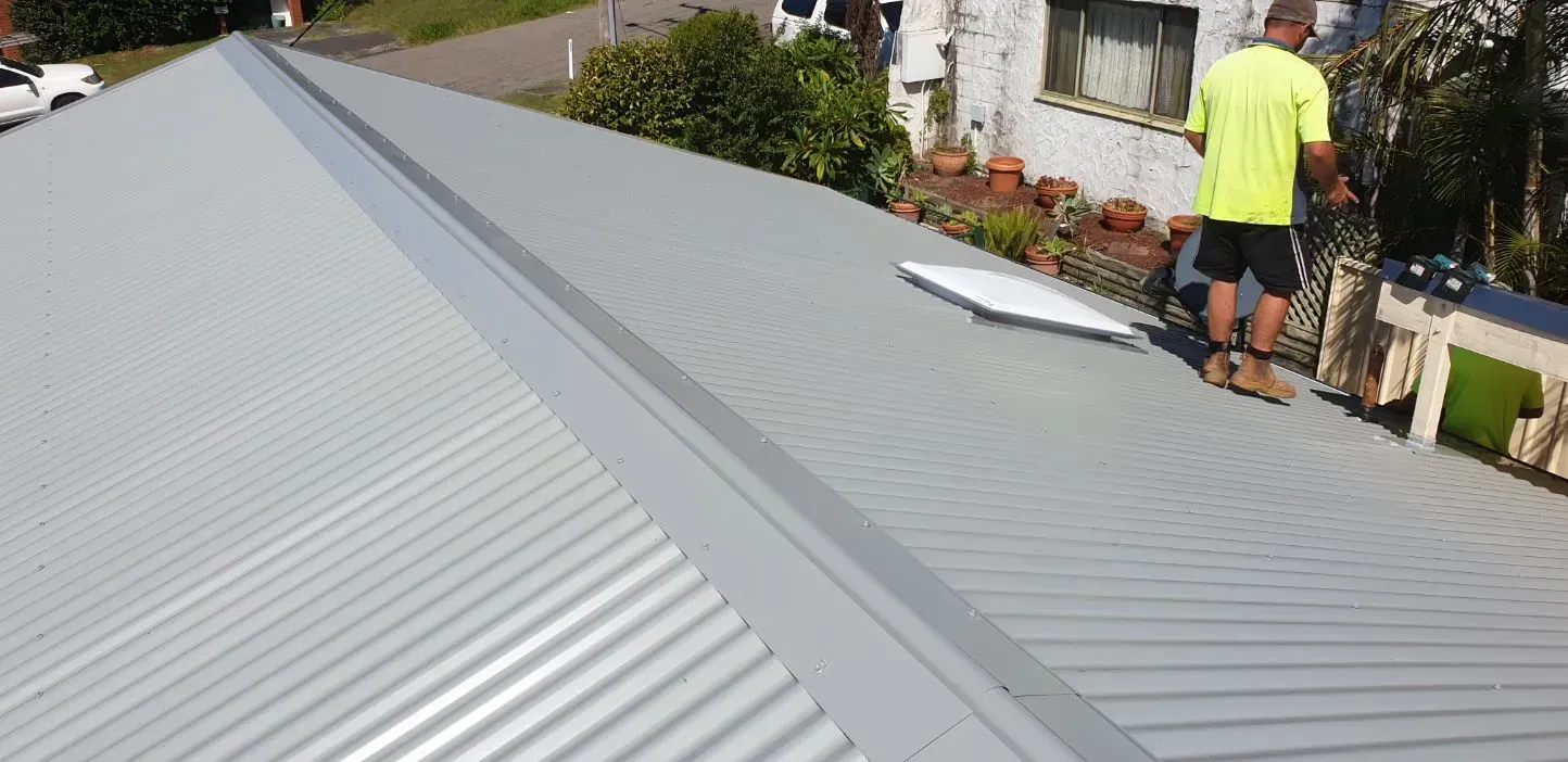 A House With a Solar Panel on the Roof — Coast Metal Roof & Gutter In Tumbi Umbi, NSW