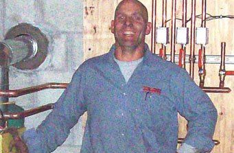 Scott Thrasher, owner and operator of Thrasher's Plumbing & Heating in Plainville, MA.